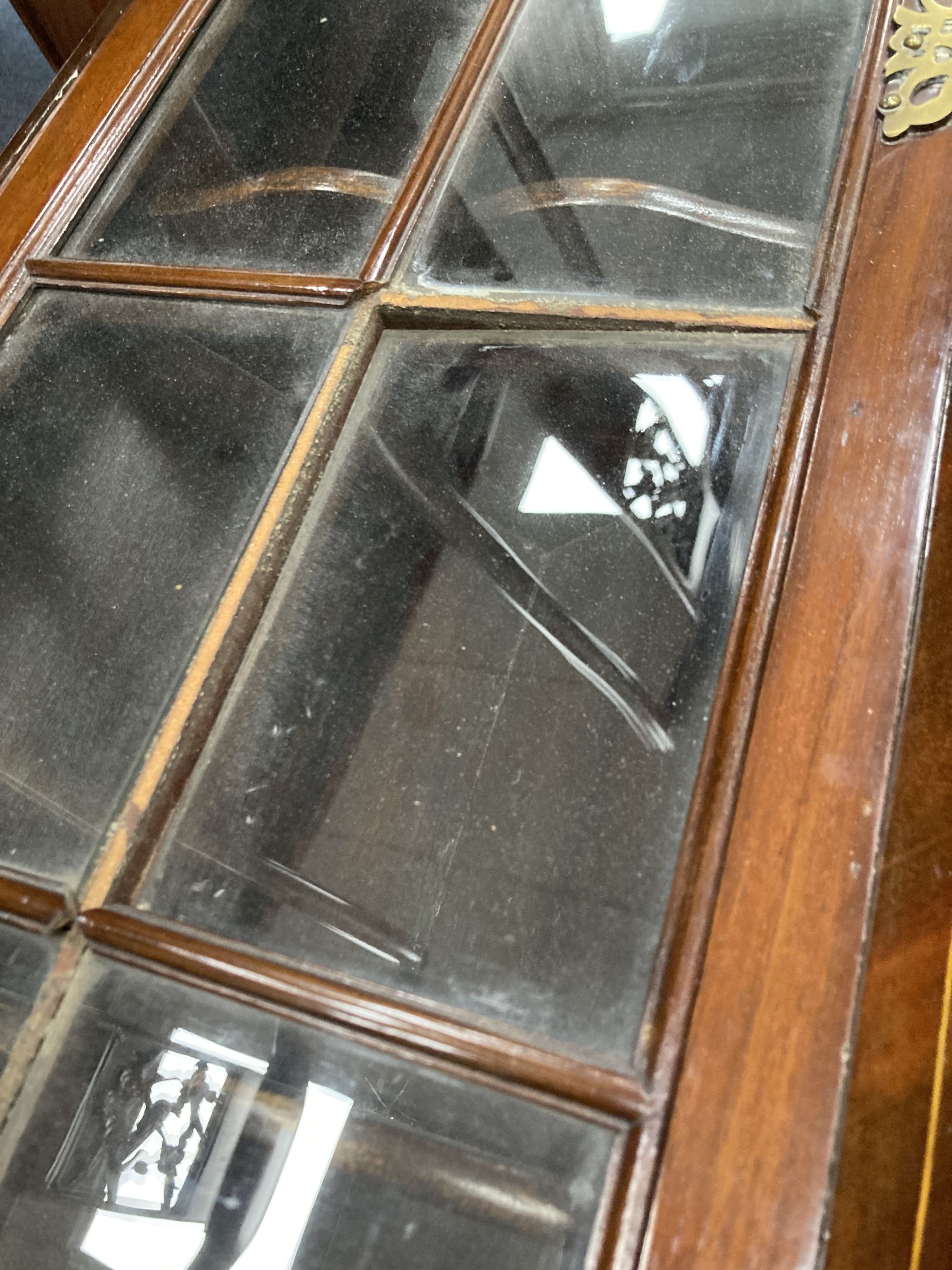 A small George III style mahogany corner cabinet, width 40cm, depth 22cm, height 66cm